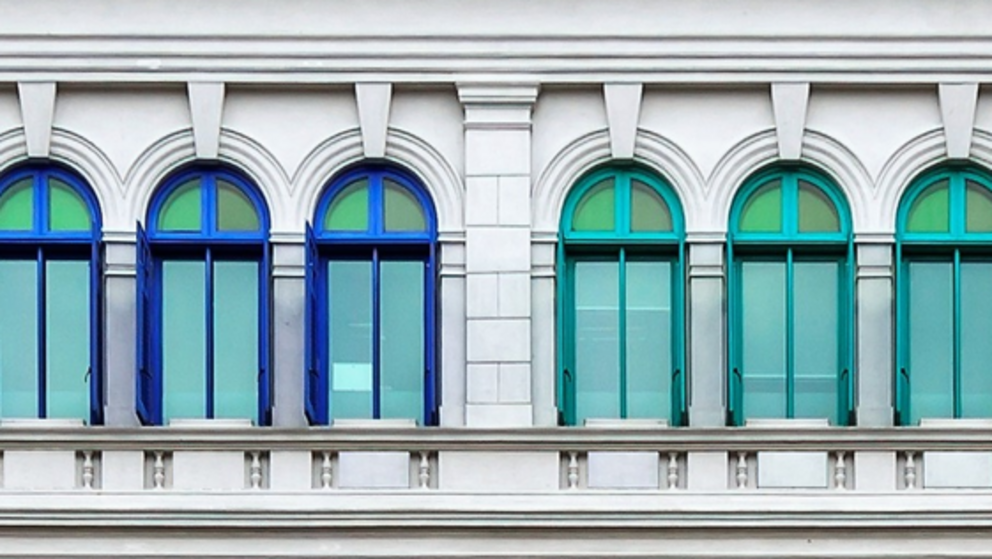3MT programme header: a series of windows with a color gradient from blue on the left to green on the right, meant to represent different roundtable topics within this capstone IBS English event